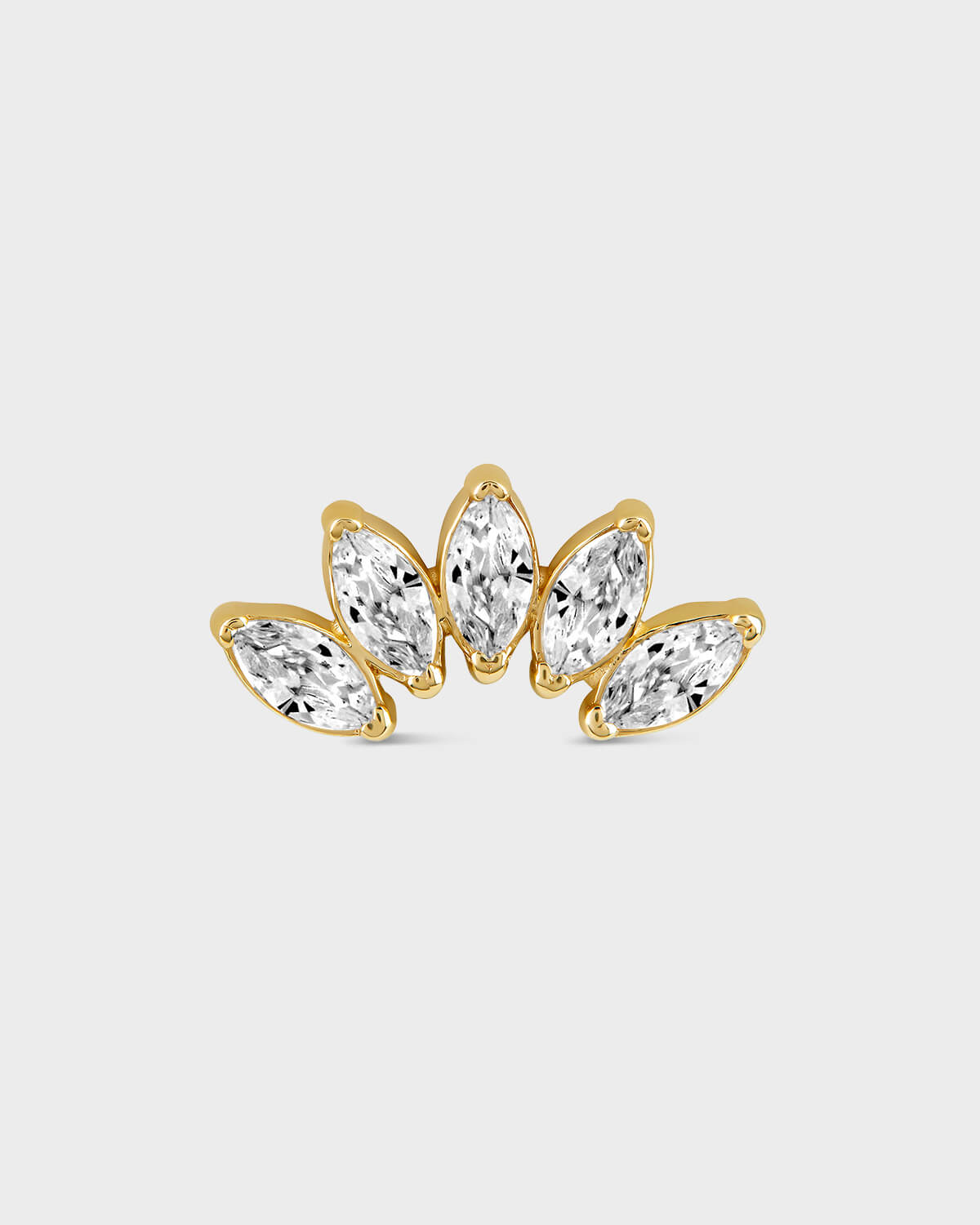Gold earring with five marquise gems on a light gray background