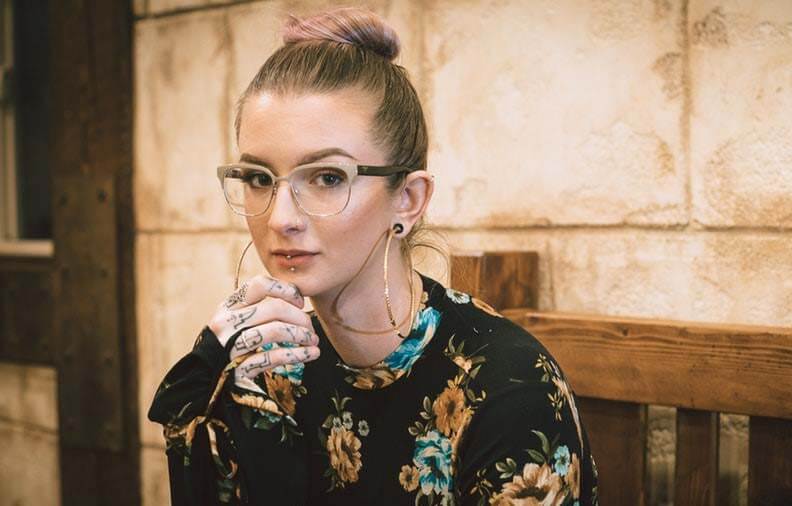 Woman with gold hoop earrings