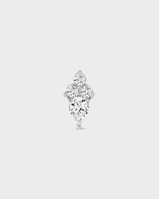 Diamond earring on a light gray background