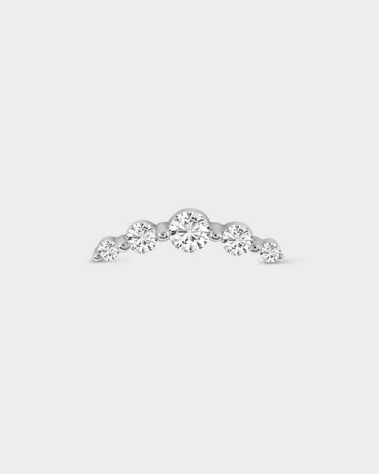 Diamond earring on a light gray background