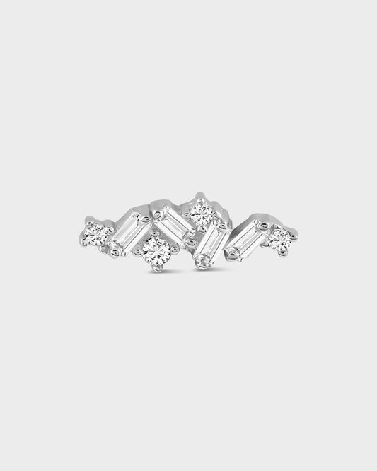 Diamond earring on a light gray background