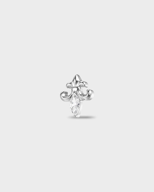 Polished titanium earring with a sculpted fleur-style shape and a marquise-cut clear stone set at the centre, on a light gray background.
