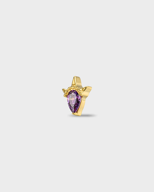 Gold titanium earring with a pear-cut amathyst purple stone set in a sculpted, pointed setting, on a light gray backgroud.