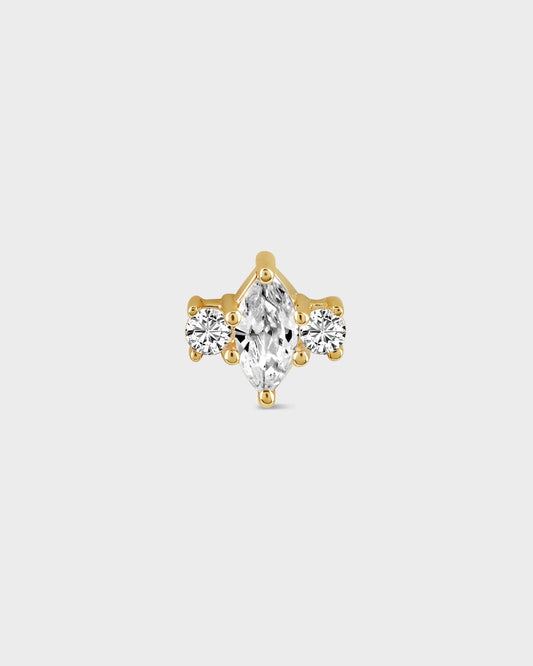 Gold earring with a central clear marquise gemstone and two round gems either side on a light gray background
