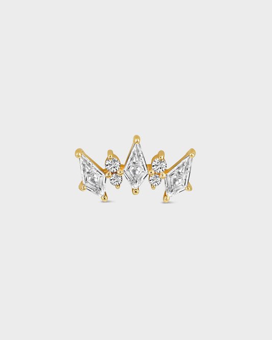Gold and diamond earring on a white background
